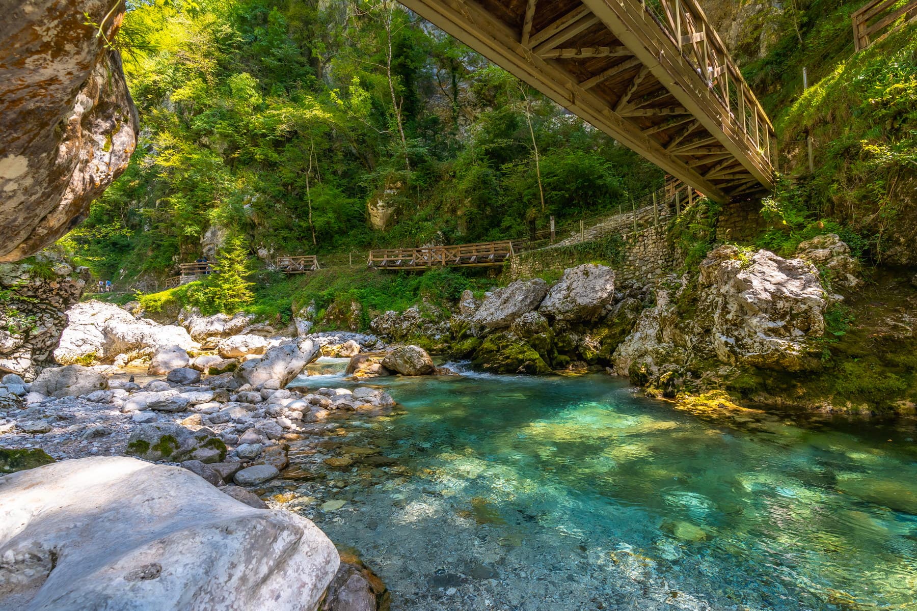 wooden-bridge-crossing-tolmin-gorges-in-slovenia-d-2025-05-24-23-45-18-utc_2